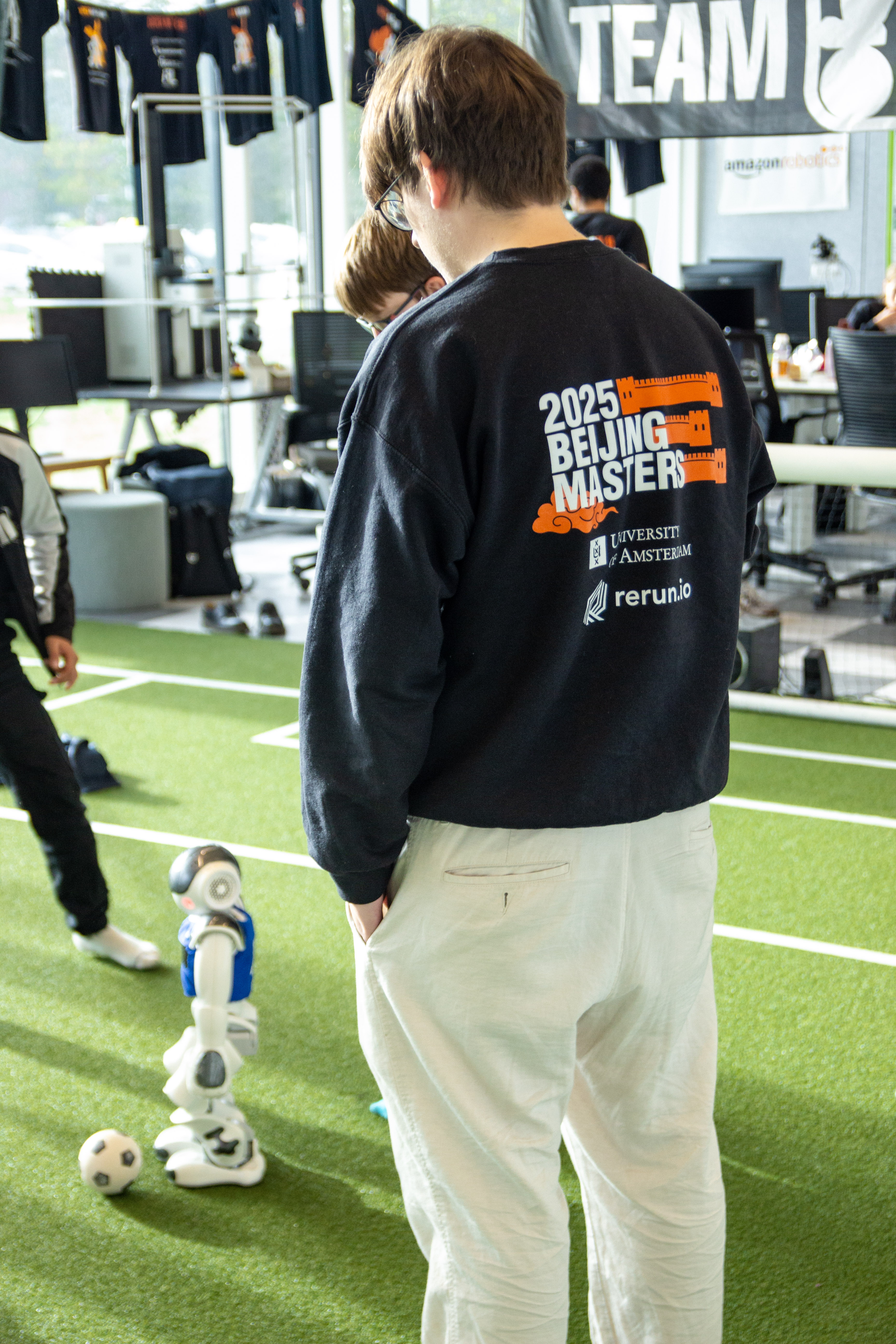 The team looking on as the robot walks around