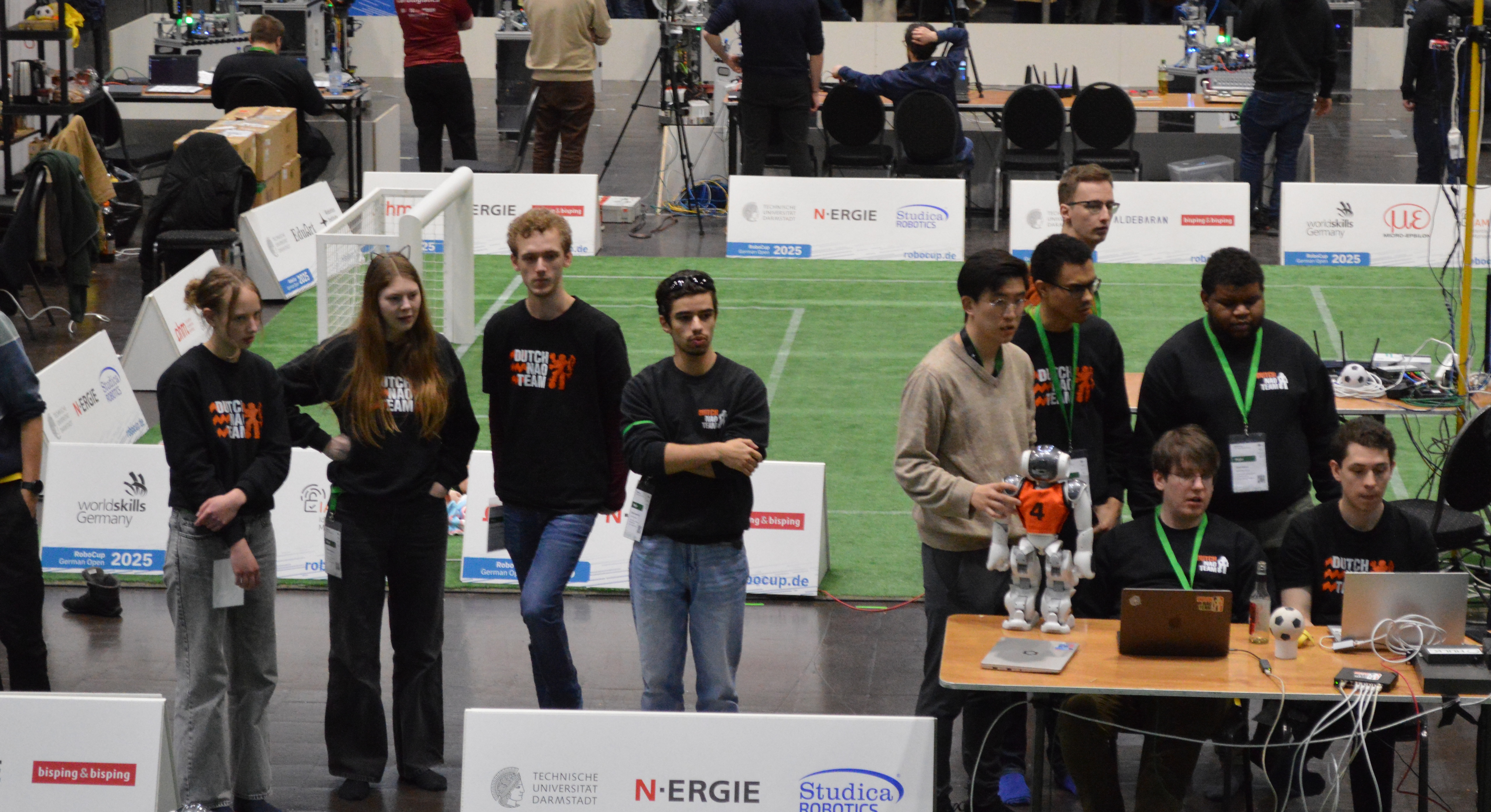 Team looking on during a match at the German Open 2025